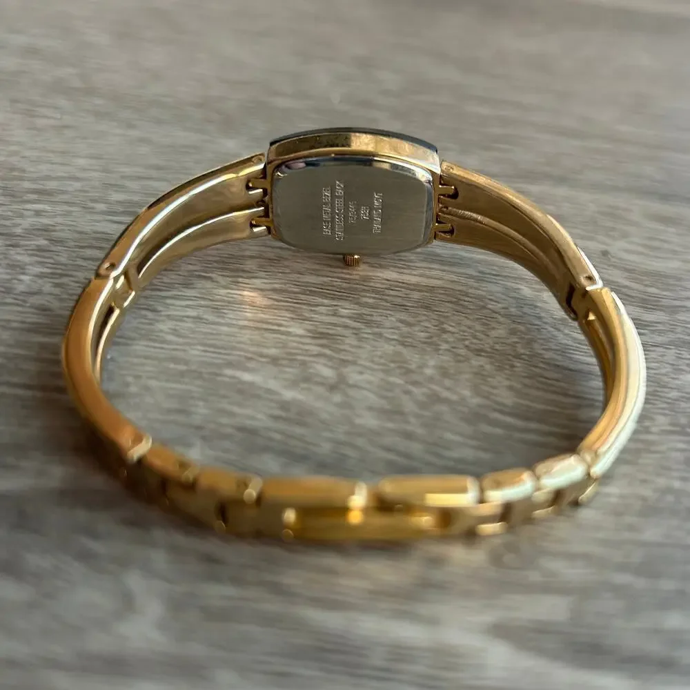 Armitron Diamond Now Blue Dial Gold Tone Bangle Watch